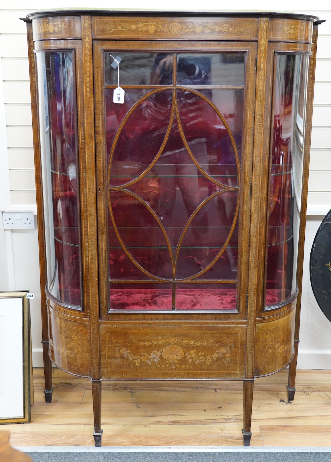 An Edwardian inlaid mahogany display cabinet, width 120cm, depth 39cm, height 169cm. Condition - fair